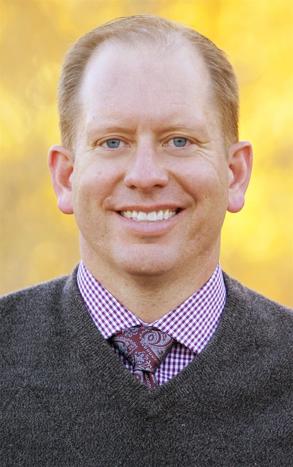 Dr. J. Brett Mangum