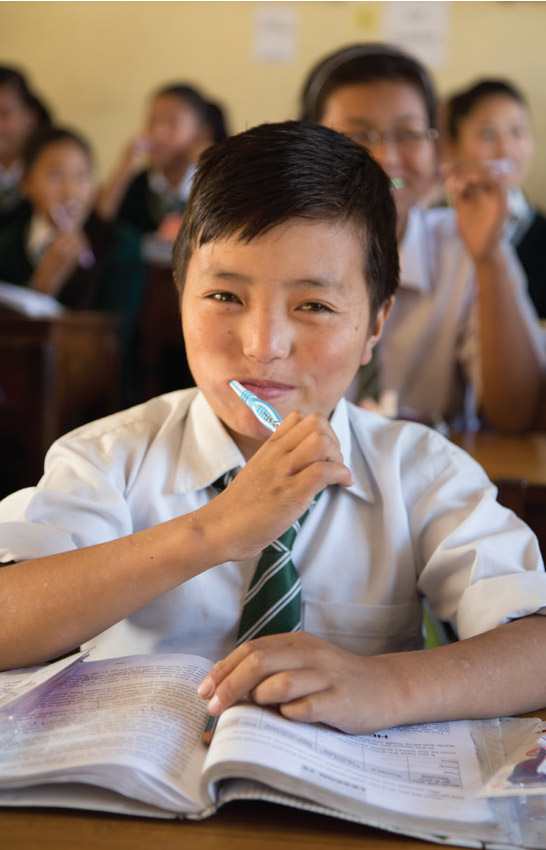 Child brushing teeth